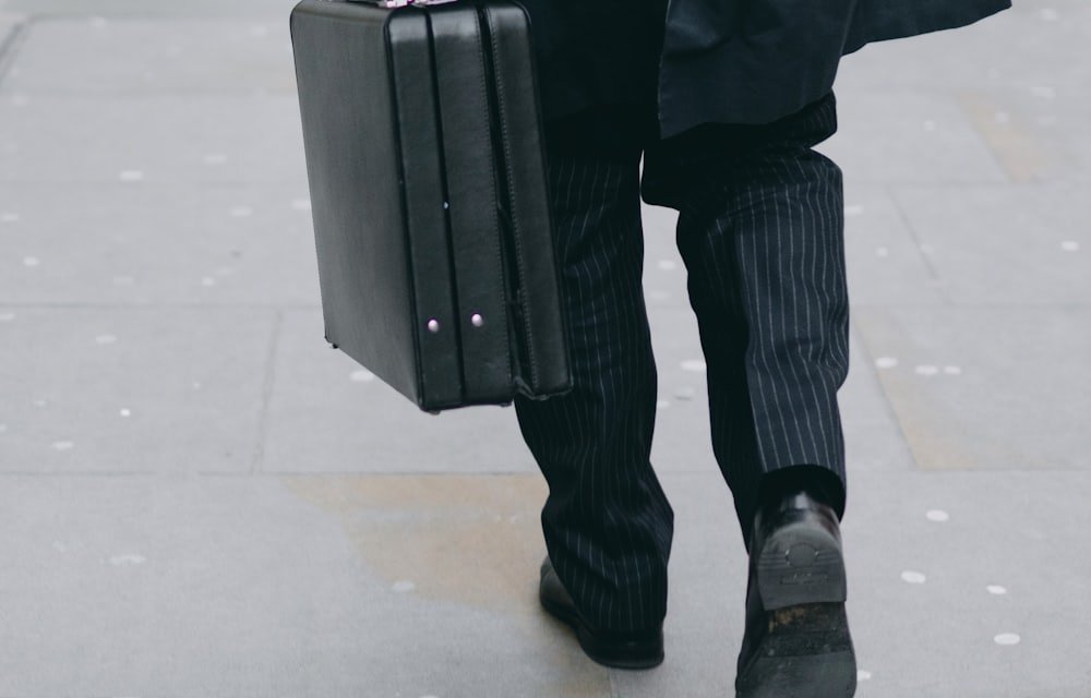 A business traveller walking with a case